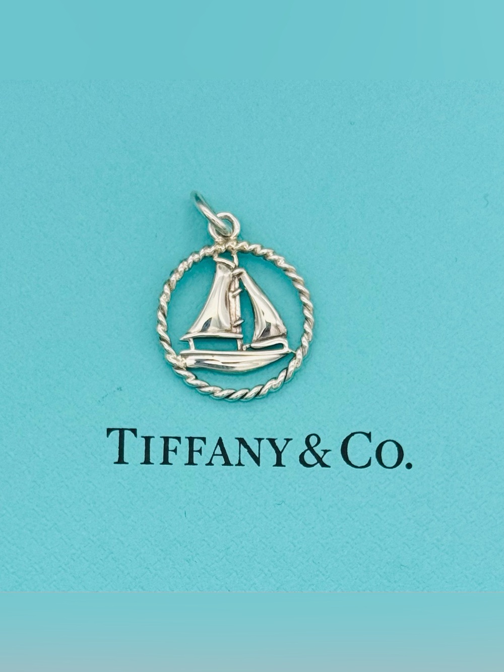 Tiffany & Co. retired silver twist Sailboat Charm